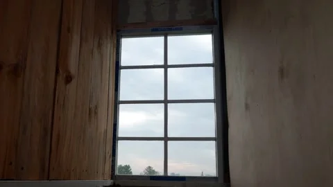 Timelapse of morning sky through Window Stock Footage 328986016