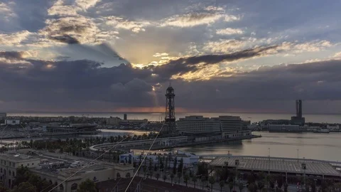 Timelapse of morning sun over clouds in Barcelona, Spain 스톡 동영상 79351742