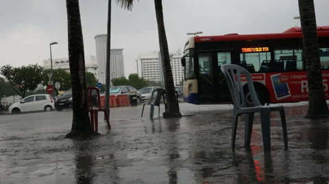 Timelapse of motion at bus stop during heavy rain downpour Stock Footage 37121768