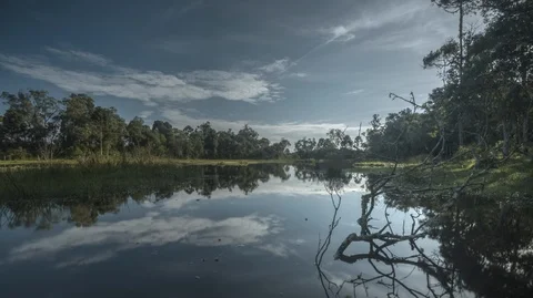Timelapse with motion of a lake with reflections 2K Stock Footage 89878583