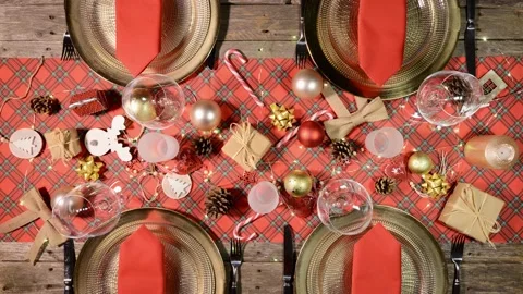 Timelapse motion lapse of red and gold christmas table being set up above view Stock Footage 142217097