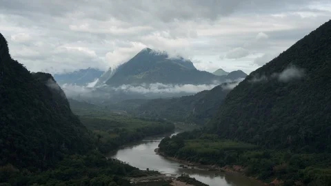 Timelapse of mouantain peak covered by clouds.heavy fog covering the mount cliff Stock Footage 112167132