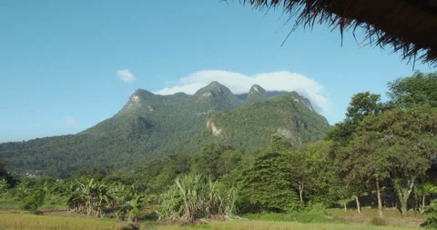 Timelapse of mountain with floating cloud on the top of hill Stock Footage 254149411