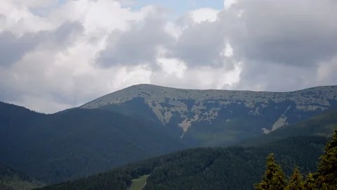 Timelapse mountain landscape with moving clouds Stock Footage 139966067