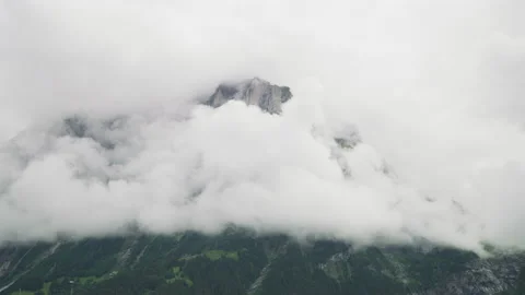 Timelapse of a mountain peak shrouded in clouds Stock Footage 219061239