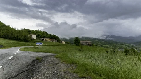 Timelapse of a mountain road during rainy day Stock Footage 116804063