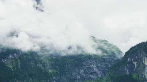 Timelapse of a mountain shrouded in clouds Stock Footage 219715951