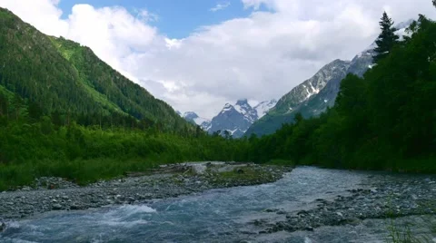Timelapse of mountain valley with river and forest in Kavkaz region 스톡 동영상 65773190