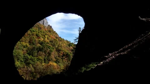 Timelapse of Mountain View Through Cave Opening Stock Footage 266795123