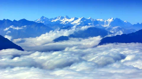 Timelapse of mountains with clouds rolling through the valley Stock Footage 46202500