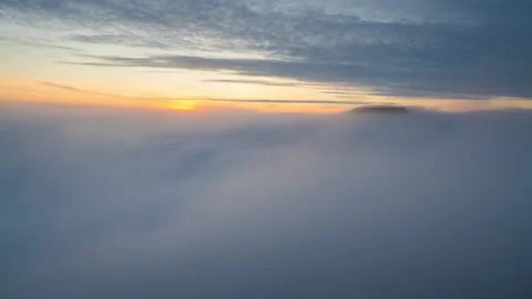 Timelapse of the mountains in the clouds at sunset. Faroe islands Video stock 163511174