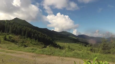 Timelapse mountains flying clouds beautiful weather Stock Footage 137921966