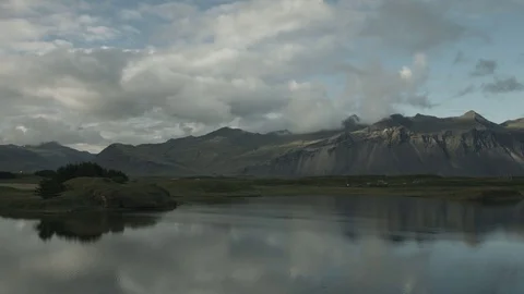 Timelapse of mountains, moving clouds water formation on ICELAND #10 Stock Footage 82368365