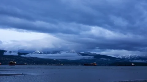 Timelapse of mountains Seymour and Grouse in Vancouver in the bay area at night. Stock Footage