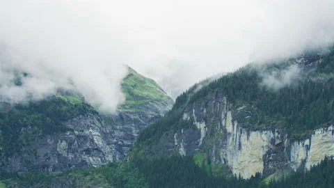 Timelapse of a mountains shrouded in clouds Stock Footage 219716284