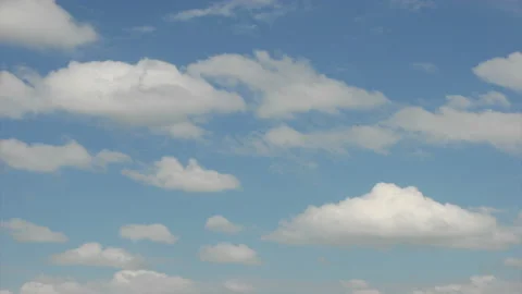 Timelapse movement and change of clouds on a blue sky Stock Footage 124711138