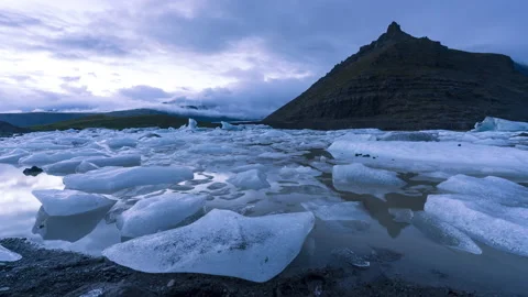 Timelapse of the movement of clouds and ice on a glacier in Iceland. Stock Footage 170327826