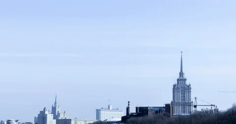 Timelapse of the movement of clouds in a big city Stock-Footage 129534884