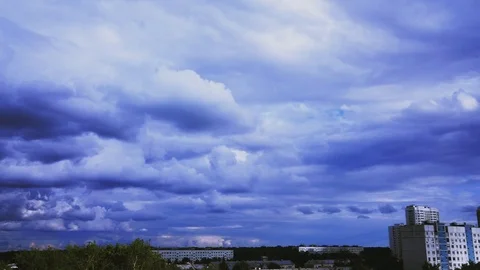 TIMELAPSE: Movement of clouds over the city Stock Footage 92761992