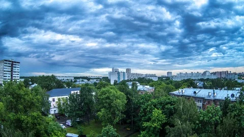 TIMELAPSE: Movement of clouds over the city Stock Footage 95781219
