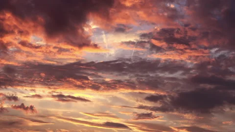 Timelapse of movement of clouds at sunset. Autumn red sky at magic hour. 4K Video stock 292599850
