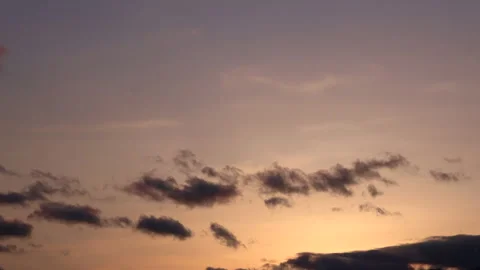 Timelapse of the movement of the clouds at sunset. Autumn gold sky. 4K Stock Footage 327946362