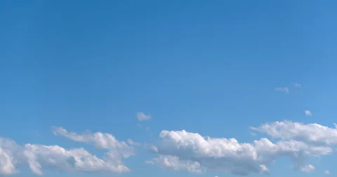 TimeLapse - Movement of cumulus clouds in sunny summer Right-to-left Copy space Stock Footage 155572692