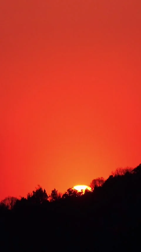 Timelapse of the movement of the sun and clouds at sunset. Autumn red sky. 4K Stock Footage 341644749