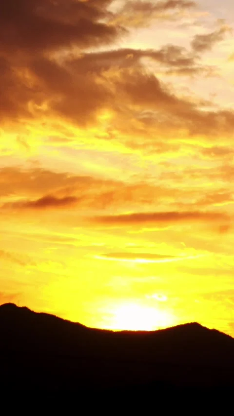 Timelapse of the movement of the sun and clouds at sunset. Autumn golden sky. 4K Stock Footage 344947012