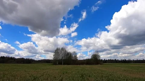 Timelapse moves beautiful white clouds across the blue sky Video stock 153741045