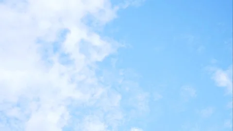 Timelapse of moving beautiful white cloud with blue sky background at day tim Video stock 129943979