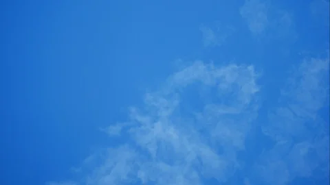 Timelapse of moving beautiful white cloud with blue sky background at day tim Stock Footage 129944043