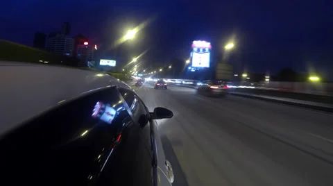 Timelapse of moving car at highway during night Stock Footage 32700566