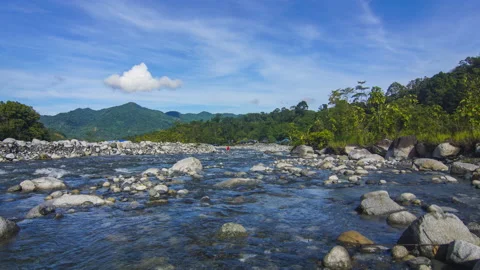 Timelapse of moving cloud and river at Kota Belud, Sabah. Stock Footage 200861074