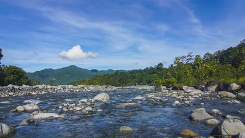 Timelapse of moving cloud and river at Kota Belud, Sabah. Stock Footage 201223053