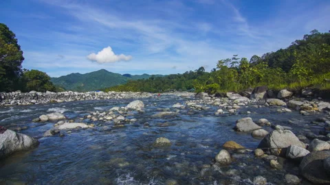 Timelapse of moving cloud and riverat Kota Belud, Sabah. Stock Footage 201275340