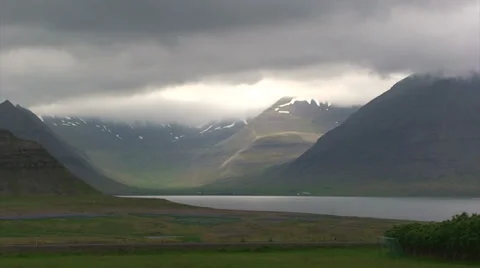 Timelapse of moving cloud cover over fjord 스톡 동영상 37269889