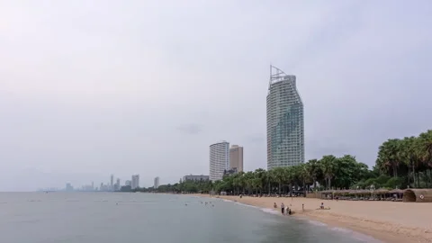 Timelapse of moving clouds above a beach in Pattaya, Thailand Stock Footage 272612509
