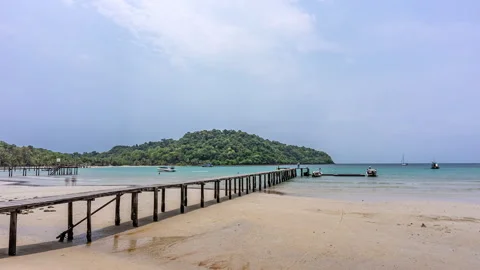 Timelapse of moving clouds above beautiful white sand beach at Koh Kood Stock Footage 272612071