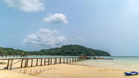 Timelapse of moving clouds above beautiful white sand beach at Koh Kood Stock Footage 272612137