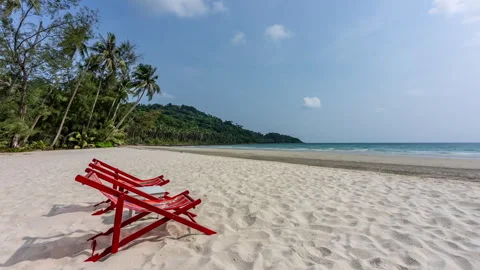 Timelapse of moving clouds above beautiful white sand beach at Koh Kood Stock Footage 272612571