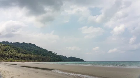 Timelapse of moving clouds above beautiful white sand beach at Koh Kood Stock Footage 272613141