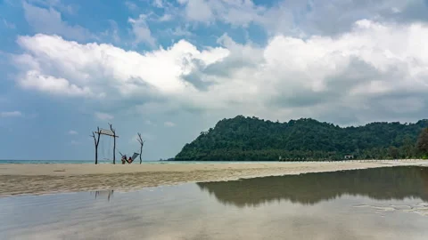Timelapse of moving clouds above beautiful white sand beach at Koh Kood Stock Footage 272613661