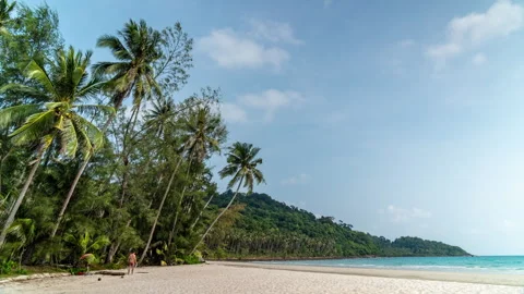 Timelapse of moving clouds above beautiful white sand beach at Koh Kood Stock Footage 272615310