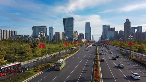 Timelapse of moving clouds above Tianfu avenue - Chengdu Stock Footage 118575385