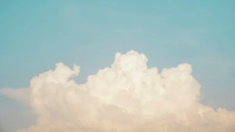 Timelapse of moving clouds and blue sky Stock Footage 129322208