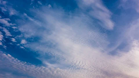 Timelapse of moving clouds and blue sky. 動画素材 145925918