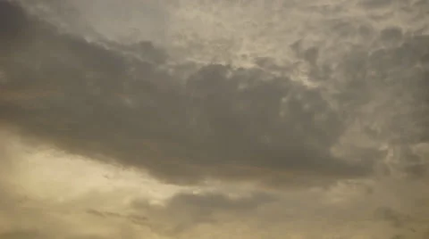 Timelapse of moving clouds and mix of sky colours during sunset Video stock 37122066