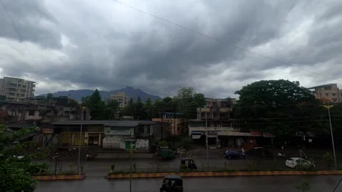 Timelapse of moving clouds and traffic in monsoon Video stock 156592885