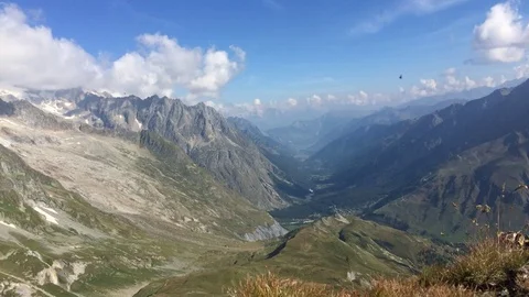 Timelapse of moving clouds in blue sky in mountain scenery Stock Footage 70998768